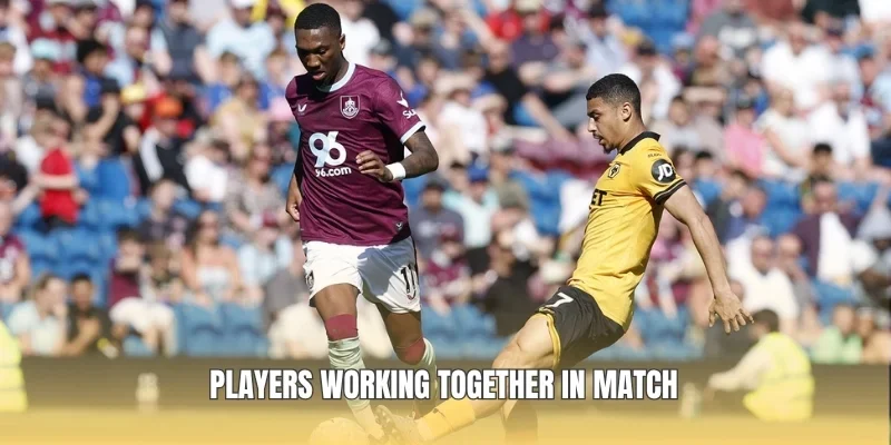 Players working together in match