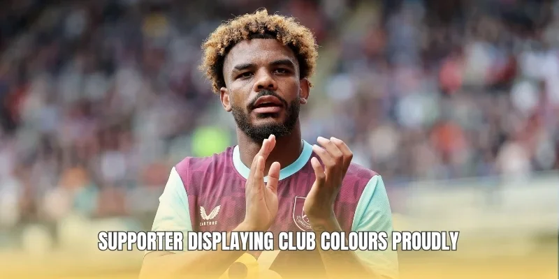 Supporter displaying club colours proudly