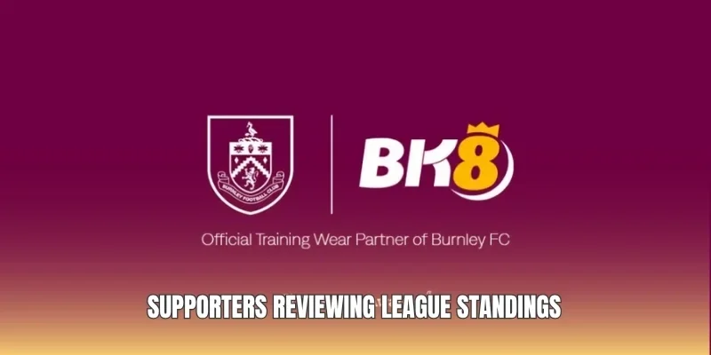 Supporters reviewing league standings