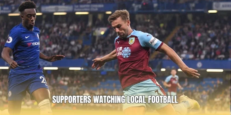 Supporters watching local football