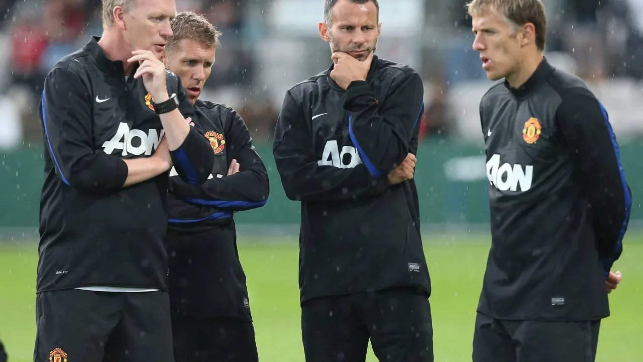 Youth team manager demonstrating leadership and coaching skills during training